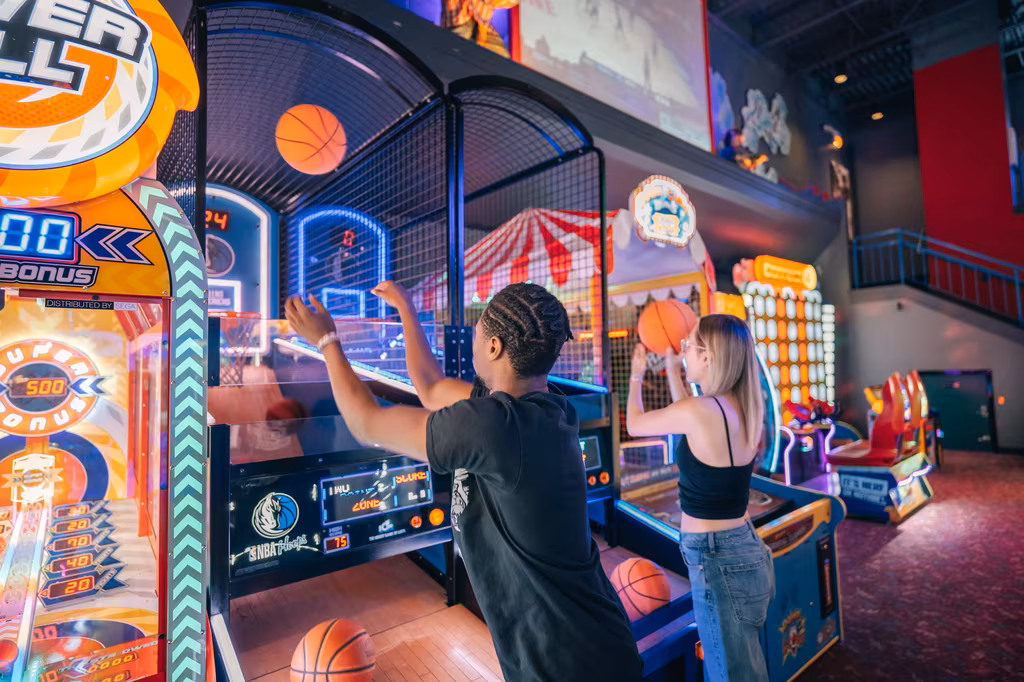 Guests enjoying arcade basketball